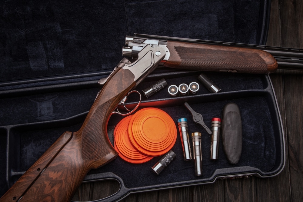 Double barrel Luxury Shotgun With Wooden Butt Lies In The Case