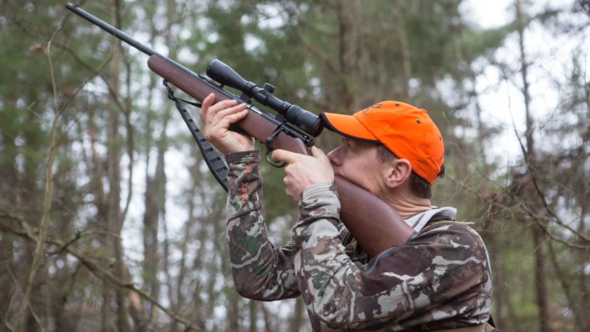 hunter targeting the squirrel for hunting