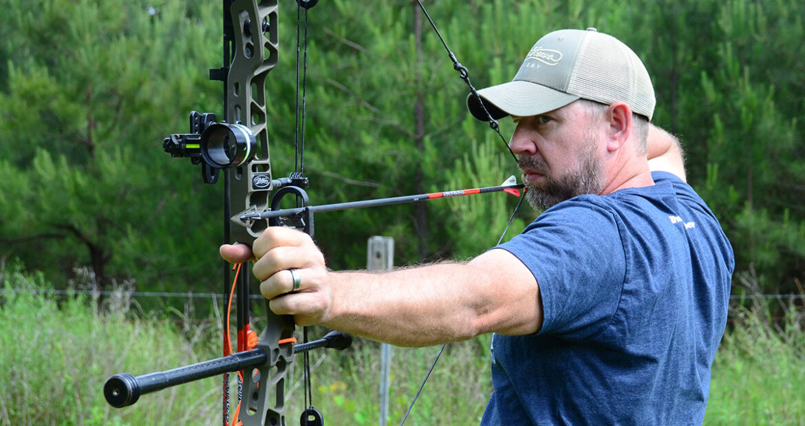 a man is using the hunting arrow while hunting